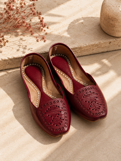 Red leather cutwork khussa – handmade design – Sole & Stylo
- soleandstylo